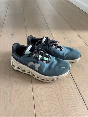 On Cloud cloud monster running shoes.